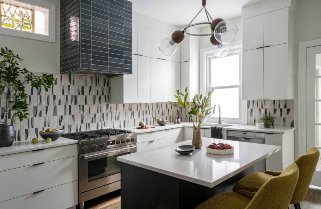 kp-home-north-woods-wi-designing-a-home-for-wellness-contemporary-kitchen-playful-patterned-tile-backsplash-blue-colors-island-with-seating-sophisticated-design