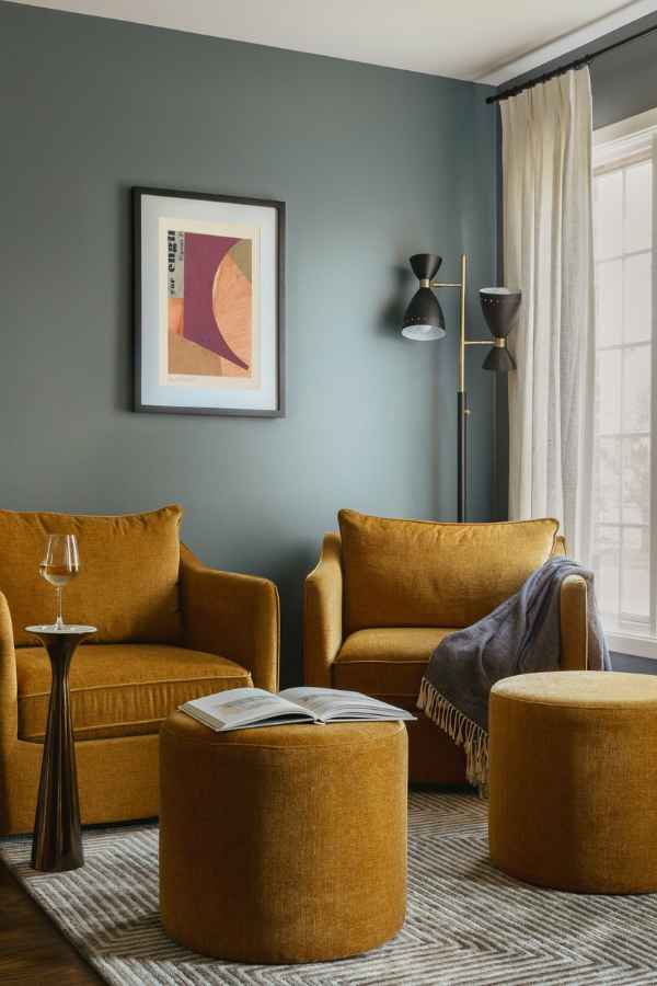 full-service-interior-design-chicago-il-timeless-family-home-renovation-downers-grove-colorful-sitting-area-mustard-yellow-chairs-teal-walls-sophisticated-remodel
