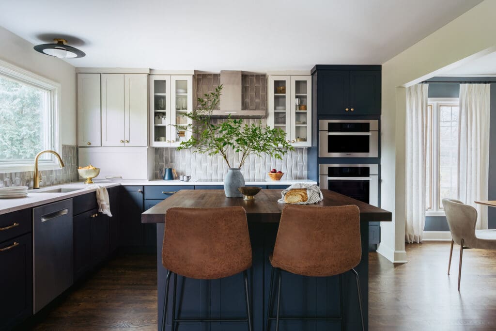 full-service-interior-designer-chicago-il-timeless-family-home-renovation-sophisticated-kitchen-blue-and-white-cabinets-wood-butcher-block-leather-bar-stools-edgy-remodel