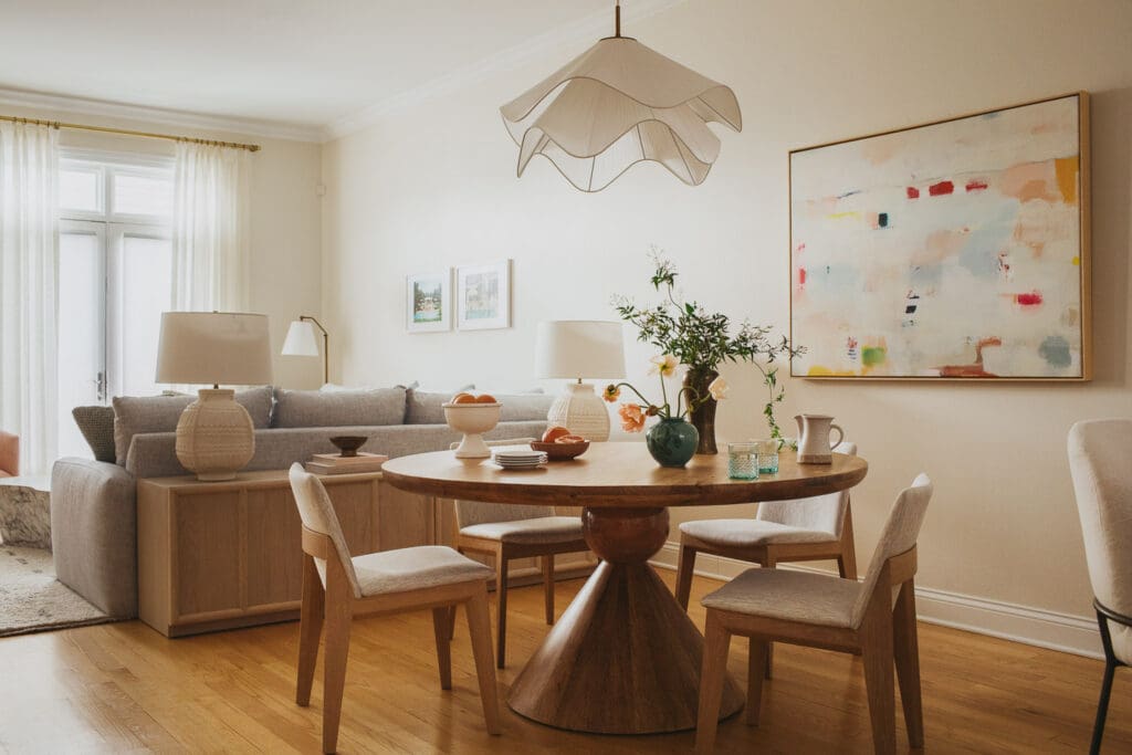 kp-home-60614-behind-the-scenes-interior-design-open-floor-plan-dining-and-living-room-soft-pastel-colors-undulating-light-fixture-meaningful